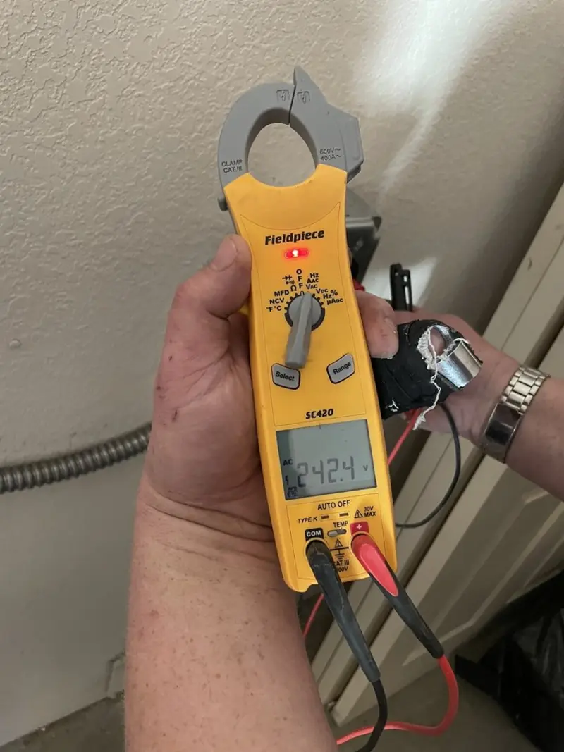 Voltage testing with clamp meter during Electrical Installation Services in Northglenn